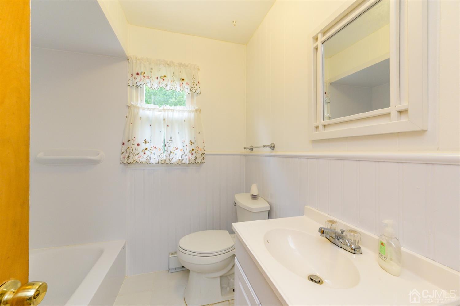286 Barbertown Point Breeze Road Frenchtown, NJ 08825 - Photo 23 of 36 a bathroom with a sink and a mirror