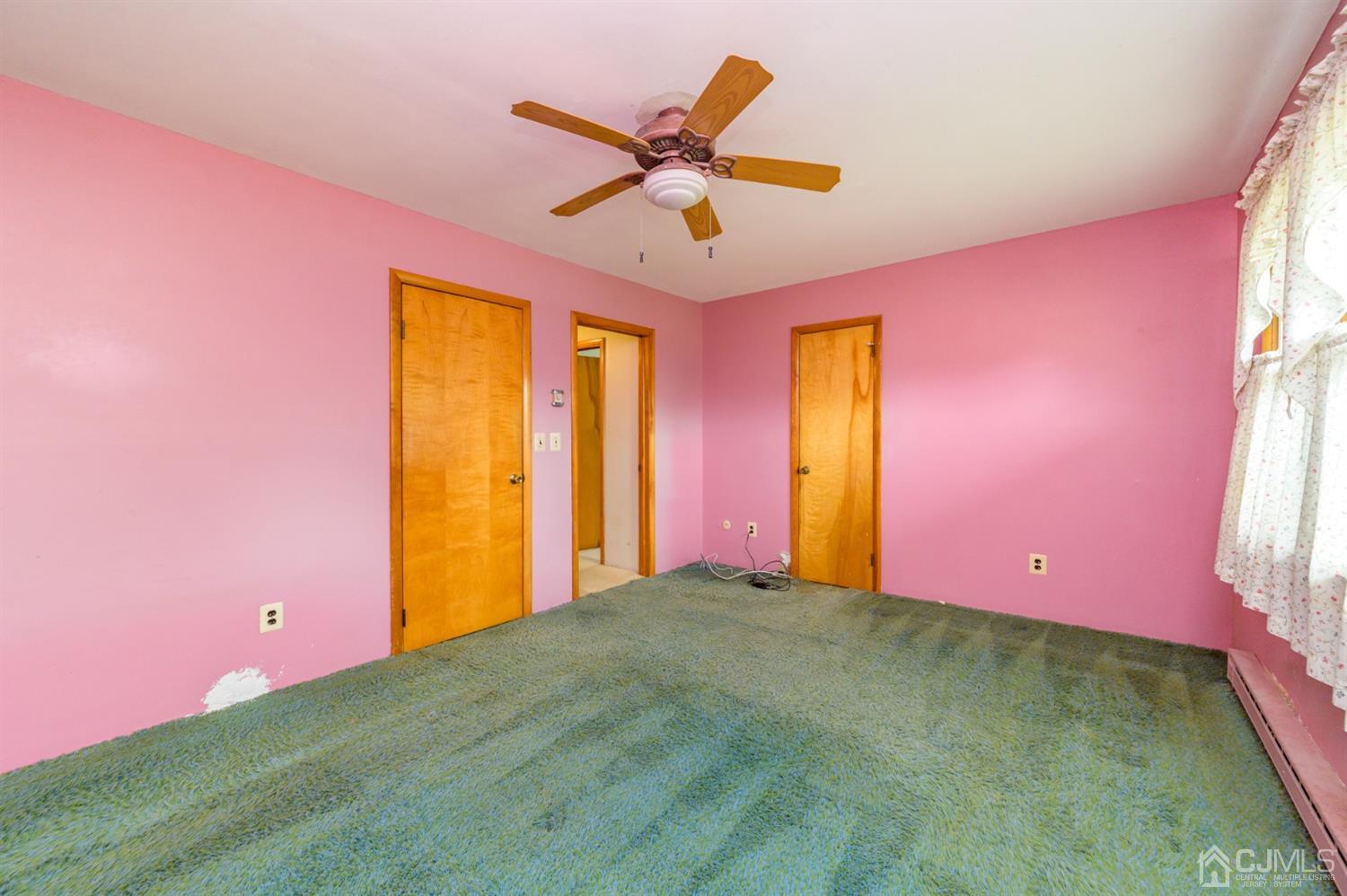 286 Barbertown Point Breeze Road Frenchtown, NJ 08825 - Photo 25 of 36 a view of a room with a ceiling fan and window