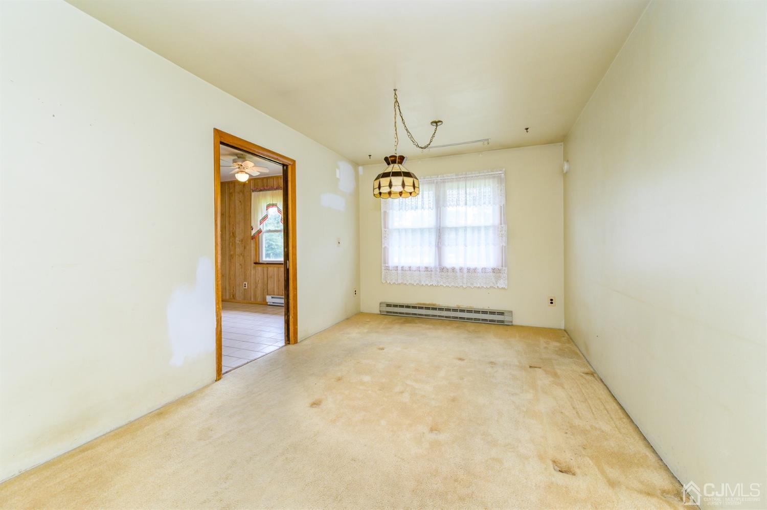 286 Barbertown Point Breeze Road Frenchtown, NJ 08825 - Photo 6 of 36 an empty room with windows