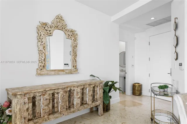 a bedroom with a bed and a table