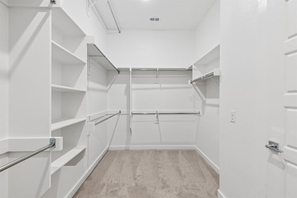 1900 Palmetto Road Celina, TX 75009 - Photo 23 of 33 Primary Closet in the Picasso II home plan by Trophy Signature Homes – REPRESENTATIVE PHOTO