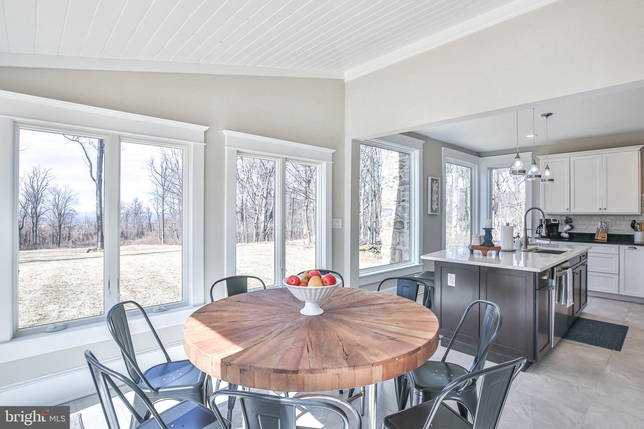 17345 Raven Rocks Road Bluemont, VA 20135 - Photo 35 of 99 a view of a dining room with furniture window and outside view