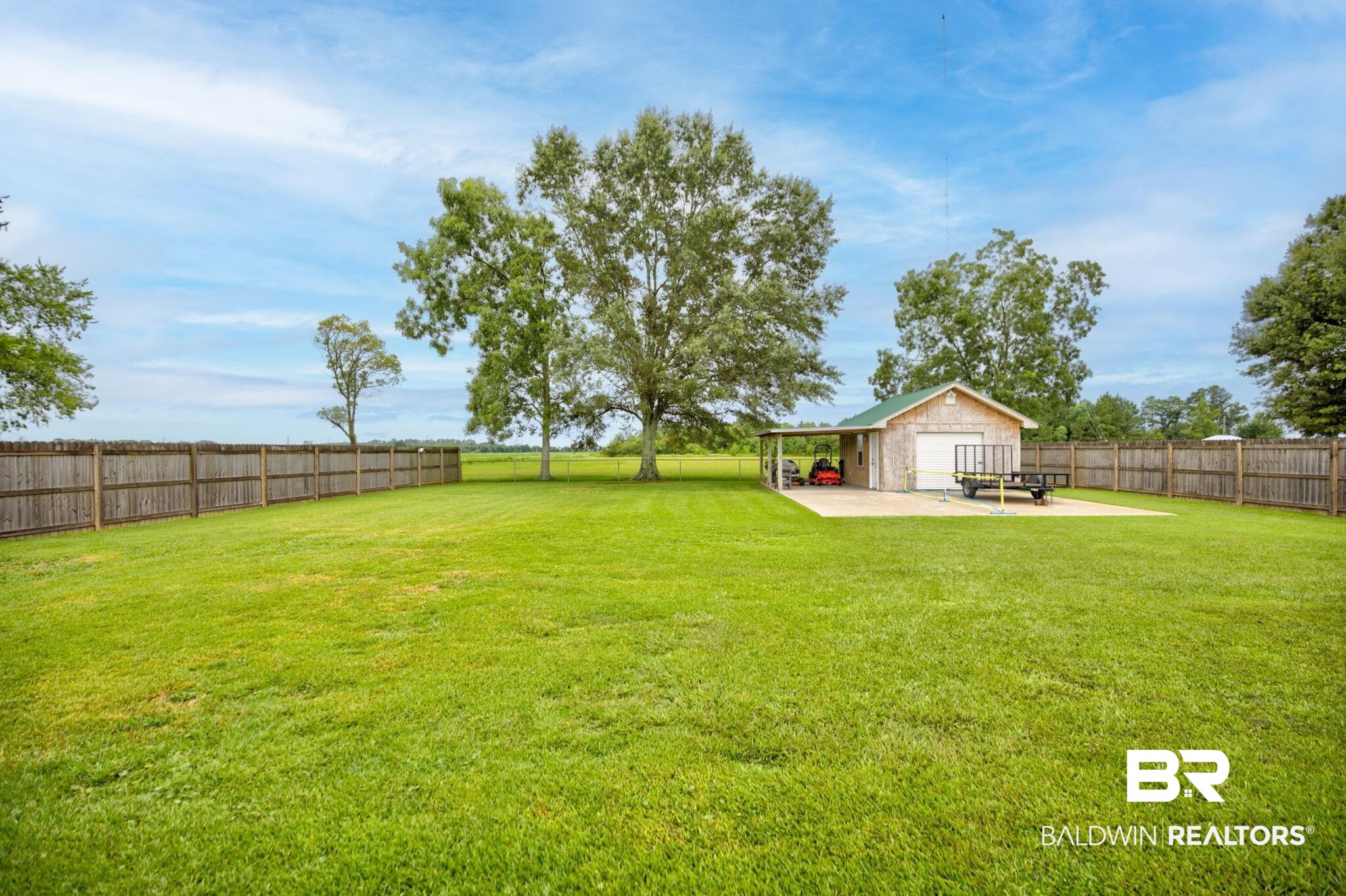 18732 Fairground Road Robertsdale, AL 36567 - Photo 40 of 46 View of yard with a patio area