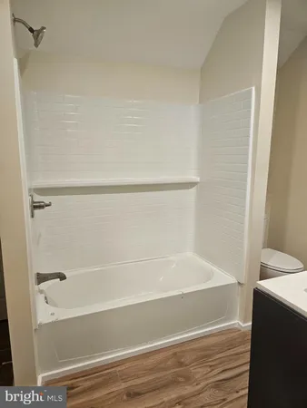 a bathroom with a bathtub