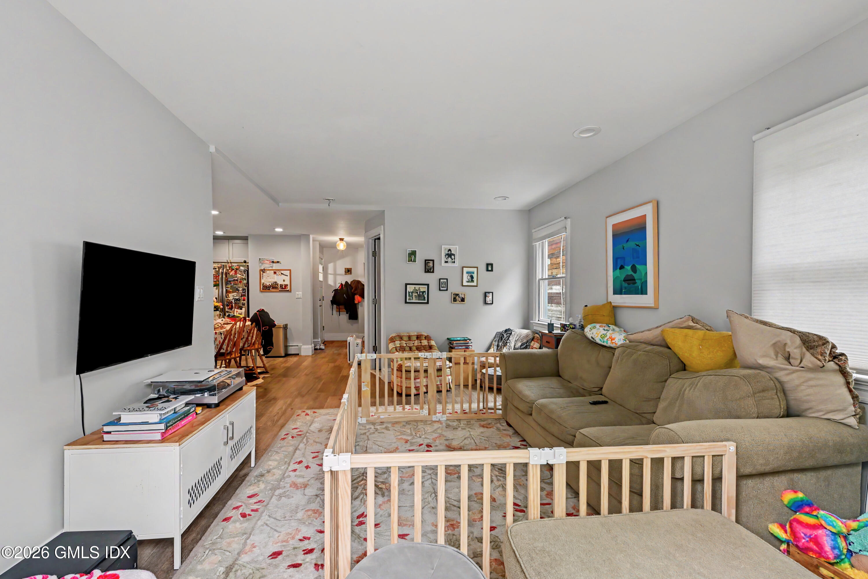 37 Prospect Street Greenwich, CT 06830 - Photo 20 of 41 a living room with furniture and a flat screen tv