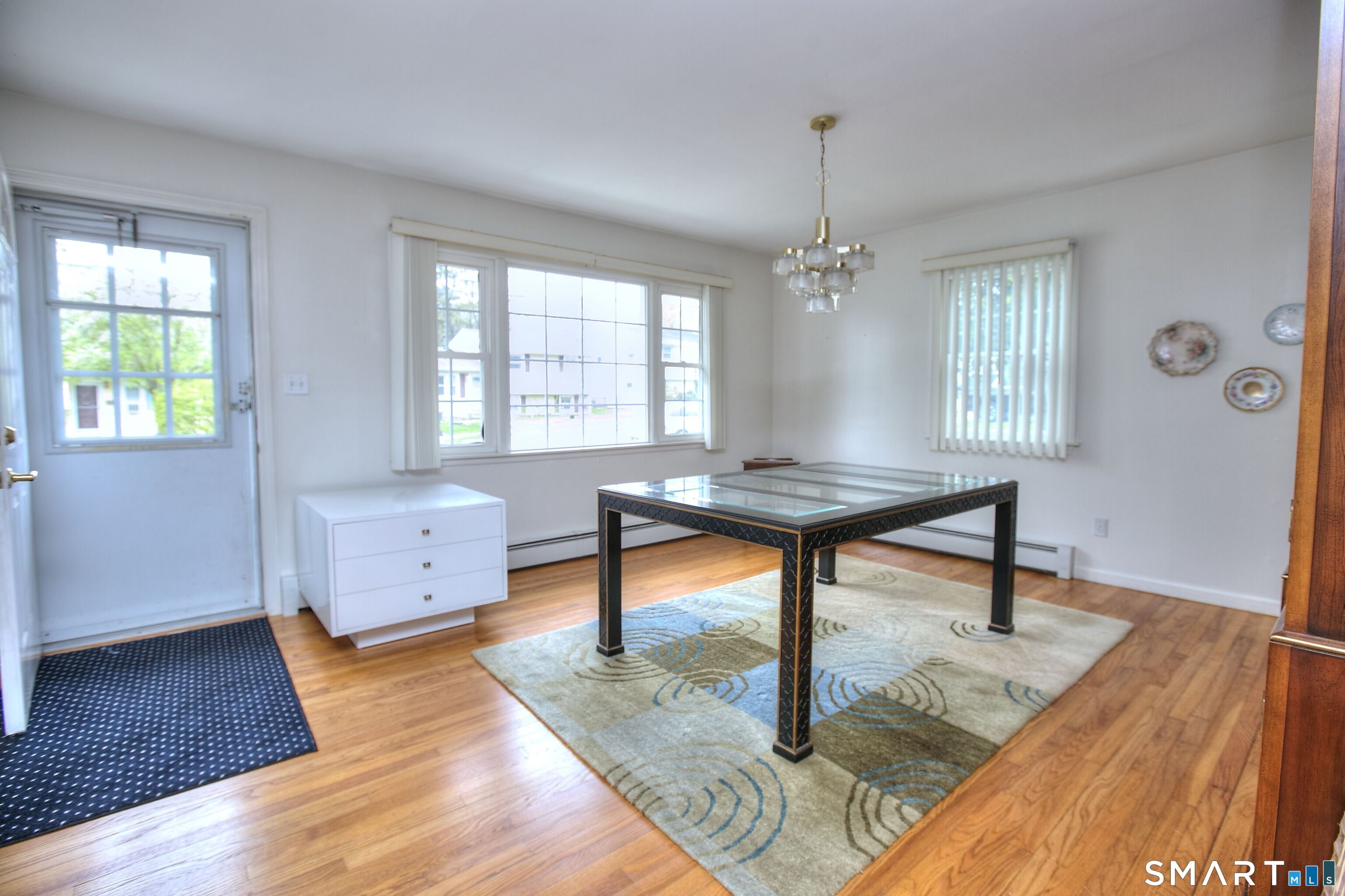 84 Youngstown Road Fairfield, CT 06824 - Photo 13 of 36 a workspace with furniture window and wooden floor