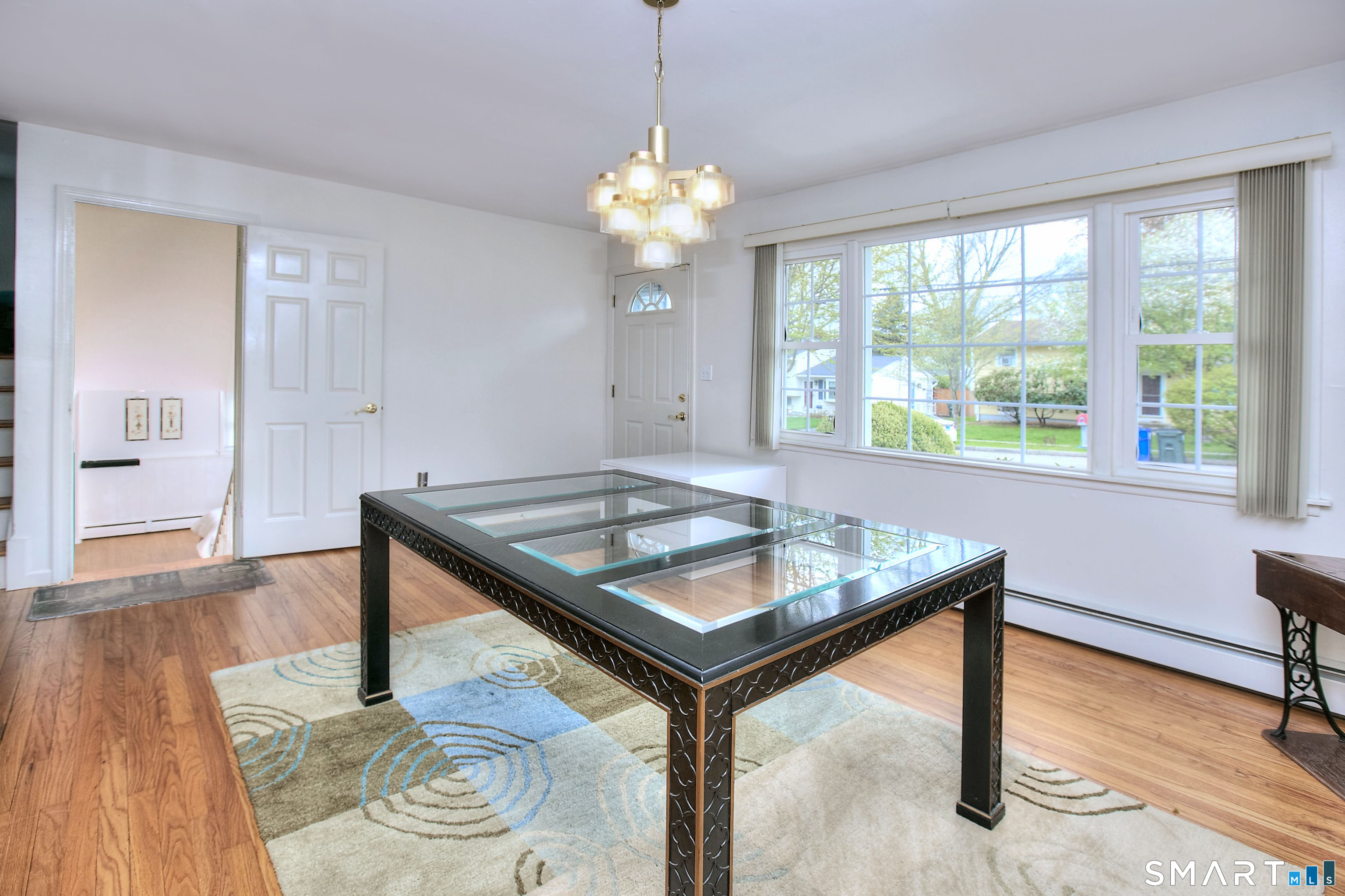 84 Youngstown Road Fairfield, CT 06824 - Photo 14 of 36 a room with table and window