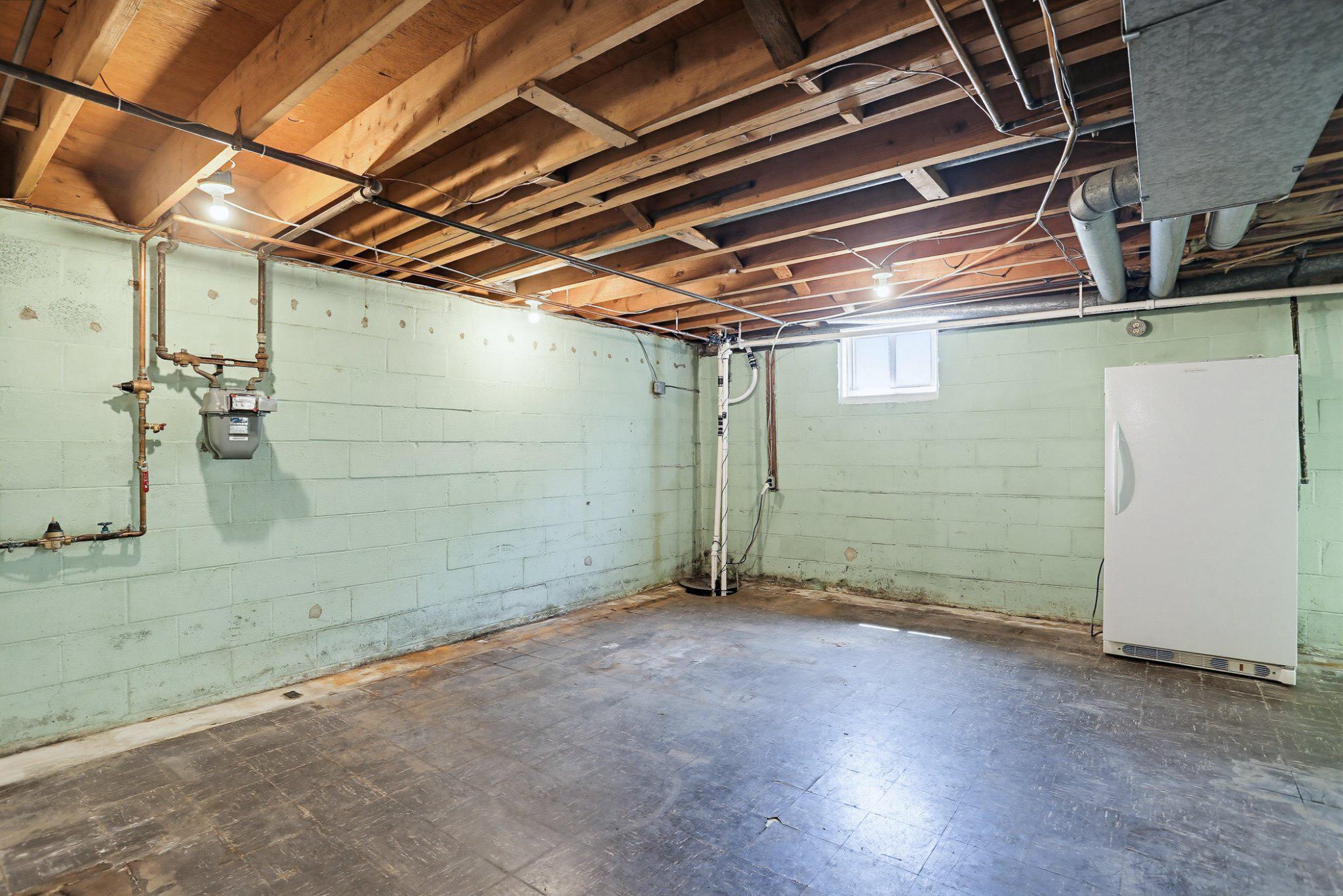 8145 Scotts Level Road Pikesville, MD 21208 - Photo 39 of 45 Spacious basement ready for transformation.