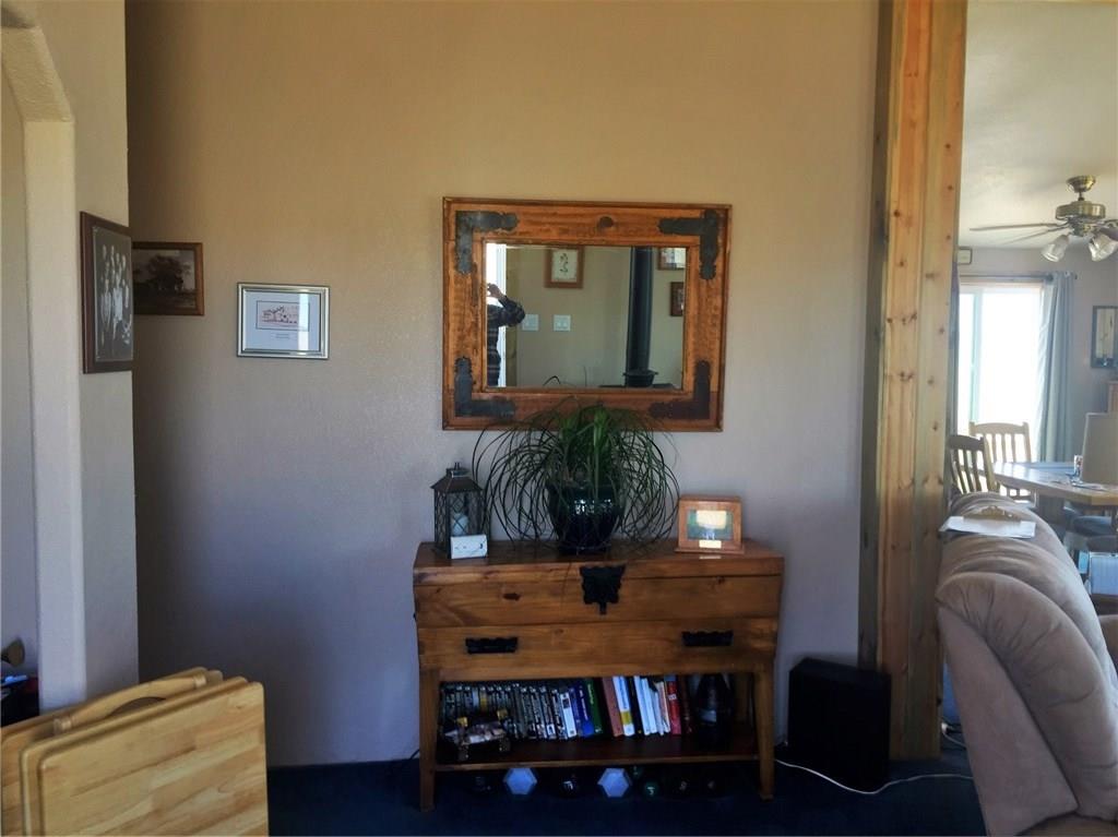 5868 Routt Road Hartsel, CO 80449 - Photo 18 of 25 a living room with furniture and wooden floor