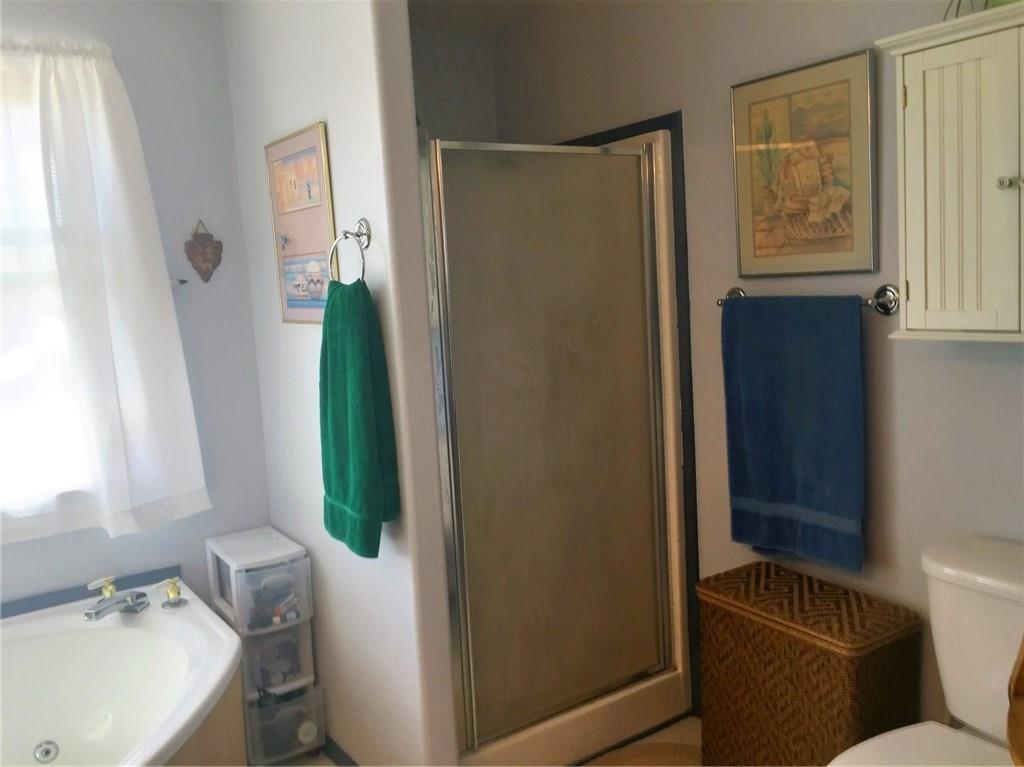 5868 Routt Road Hartsel, CO 80449 - Photo 9 of 25 a bathroom with a sink and a toilet