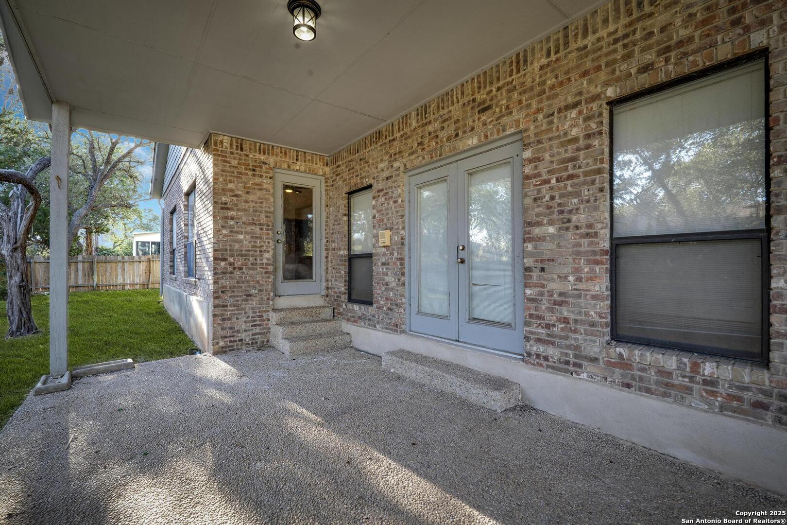 1603 Hawks Ridge Street San Antonio, TX 78248 - Photo 32 of 39 a view of a house with a yard and garage