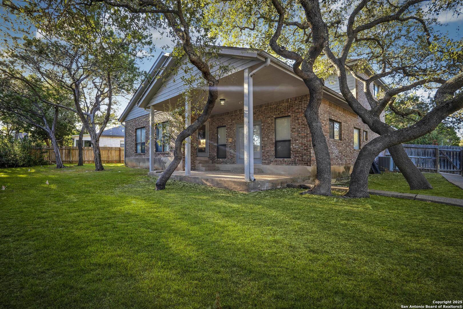 1603 Hawks Ridge Street San Antonio, TX 78248 - Photo 36 of 39 a view of a house with a yard