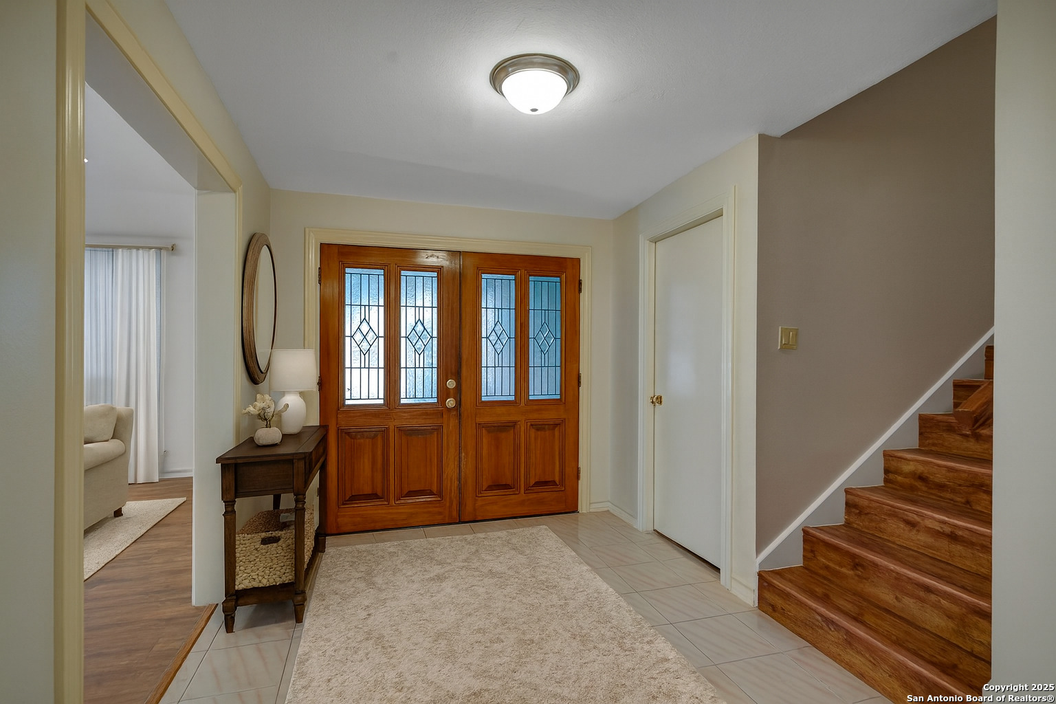 1603 Hawks Ridge Street San Antonio, TX 78248 - Photo 4 of 39 a view of hallway with staircase and a window
