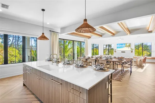 a front view of a house with outdoor seating