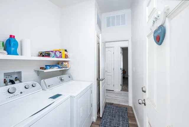 a utility room with dryer and washer