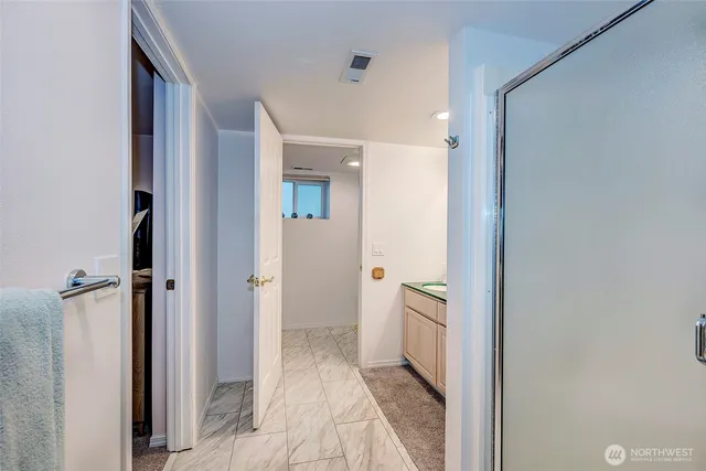 a mini theater with a bookshelf