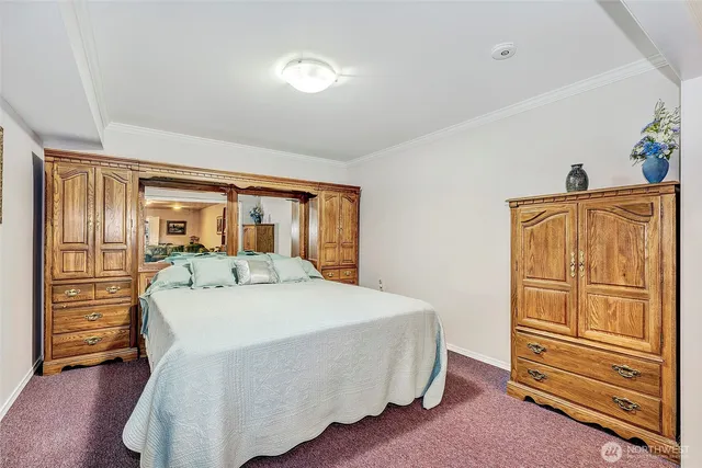 a kitchen with a sink cabinets and refrigerator