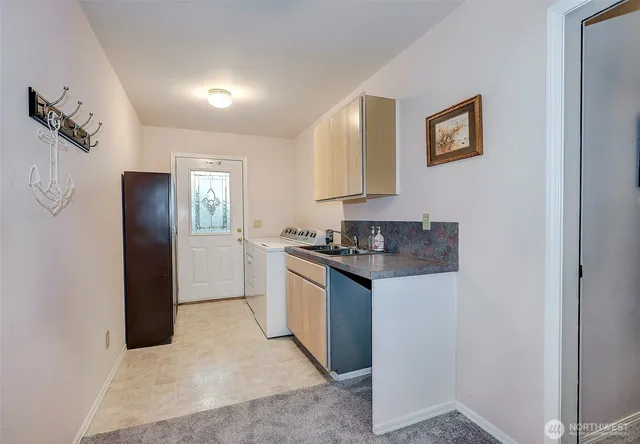 an aerial view of a house with a swimming pool