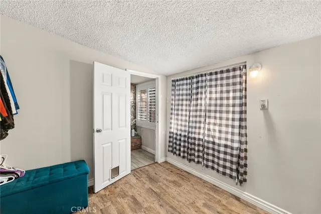 a view of entryway with bathroom