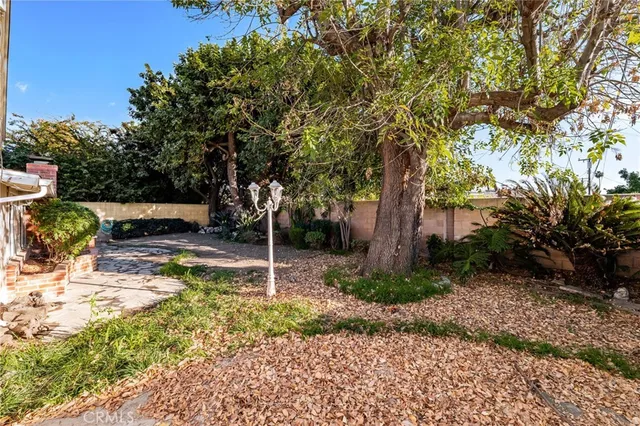 a backyard of a house with lots of green space