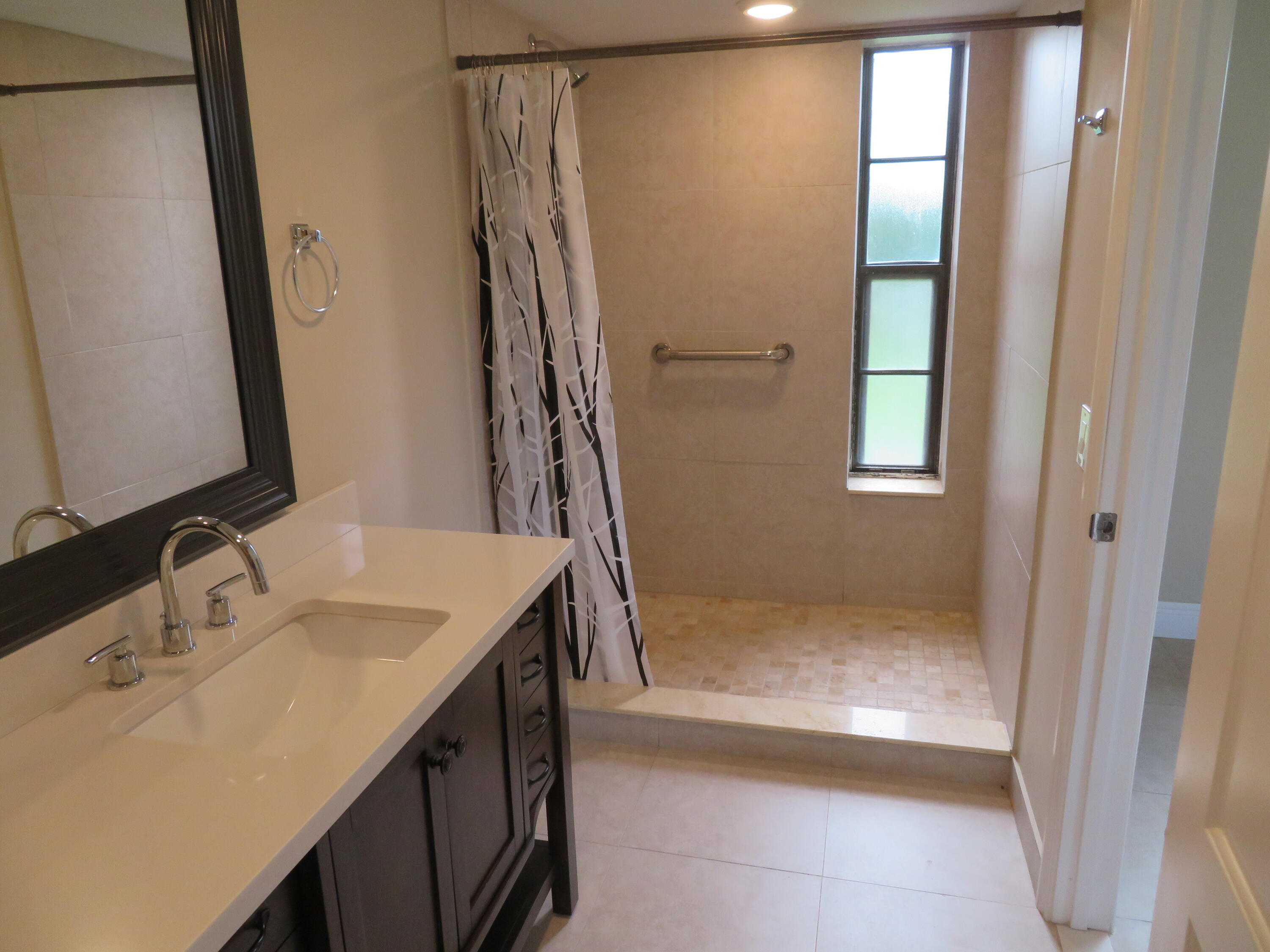 9233 Southwest 8th Street, Unit 122 Boca Raton, FL 33428 - Photo 32 of 38 68_9233-122_M-Bath