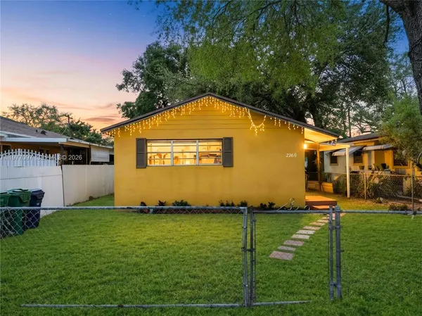 a view of swimming pool with a yard