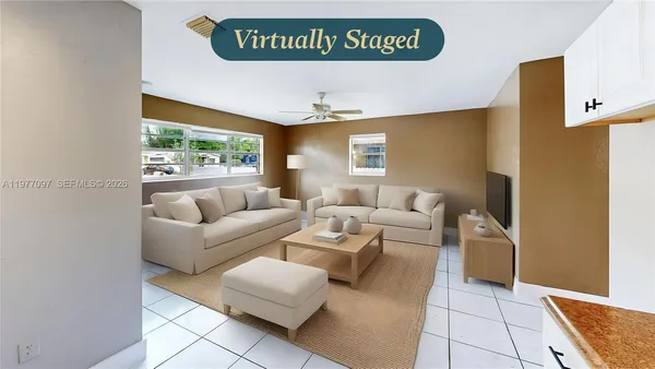 a living room with furniture and a window