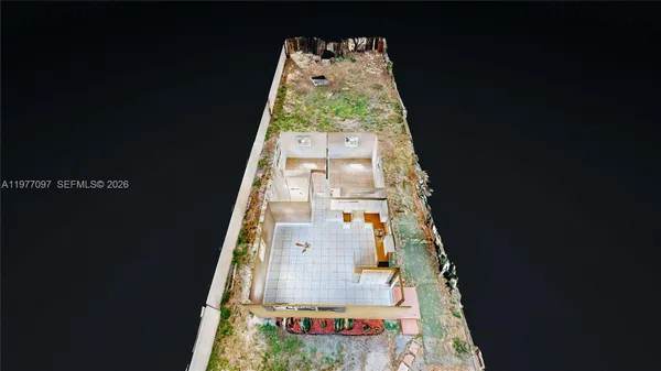 a view of a back yard of the house