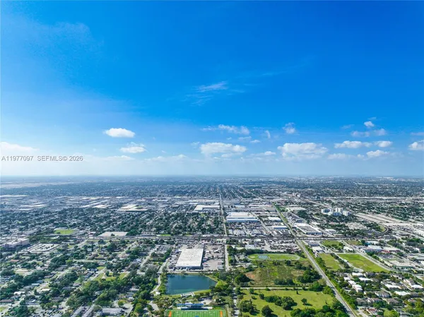 an aerial view of residential building with outdoor space