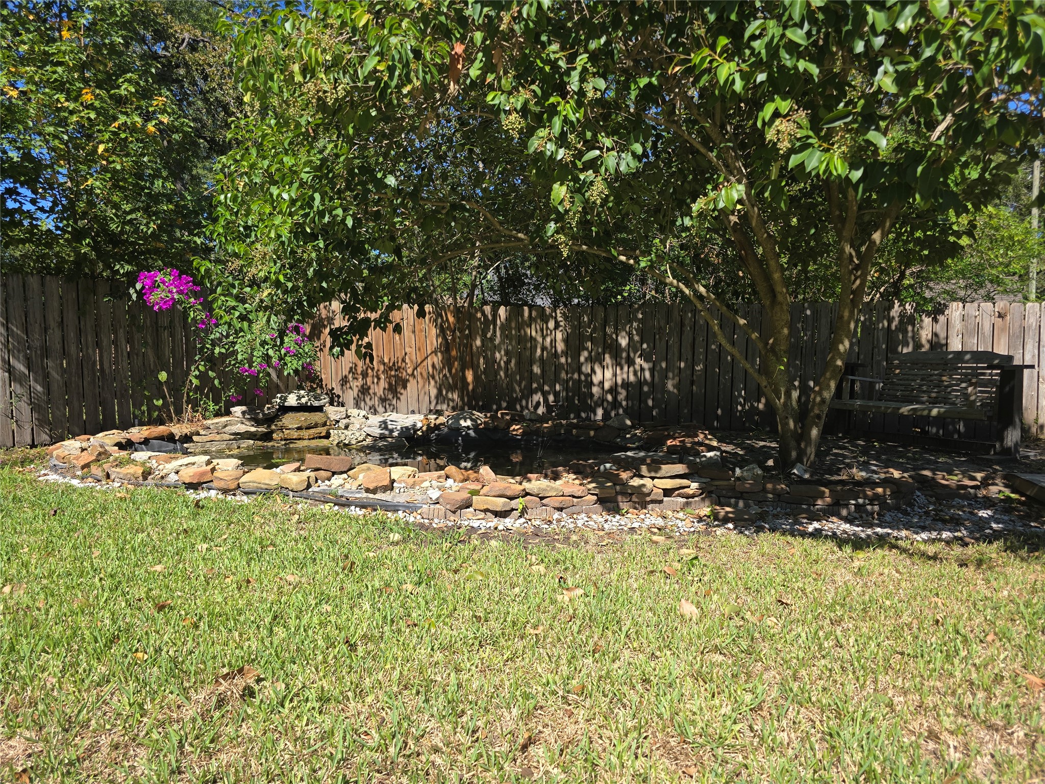 19103 Whitewood Drive Spring, TX 77373 - Photo 28 of 38 Sit in the shade looking at your peaceful koi pond and the pool