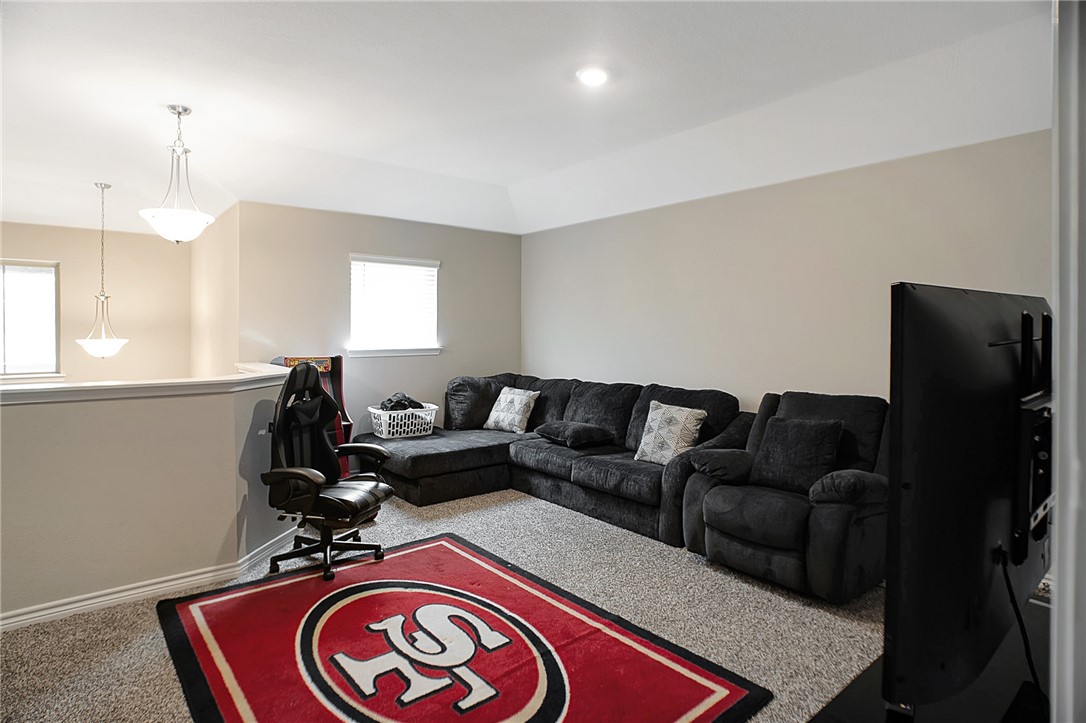 2037 Rock Rdg Avenue Bryan, TX 77807 - Photo 22 of 27 a living room with furniture and a window