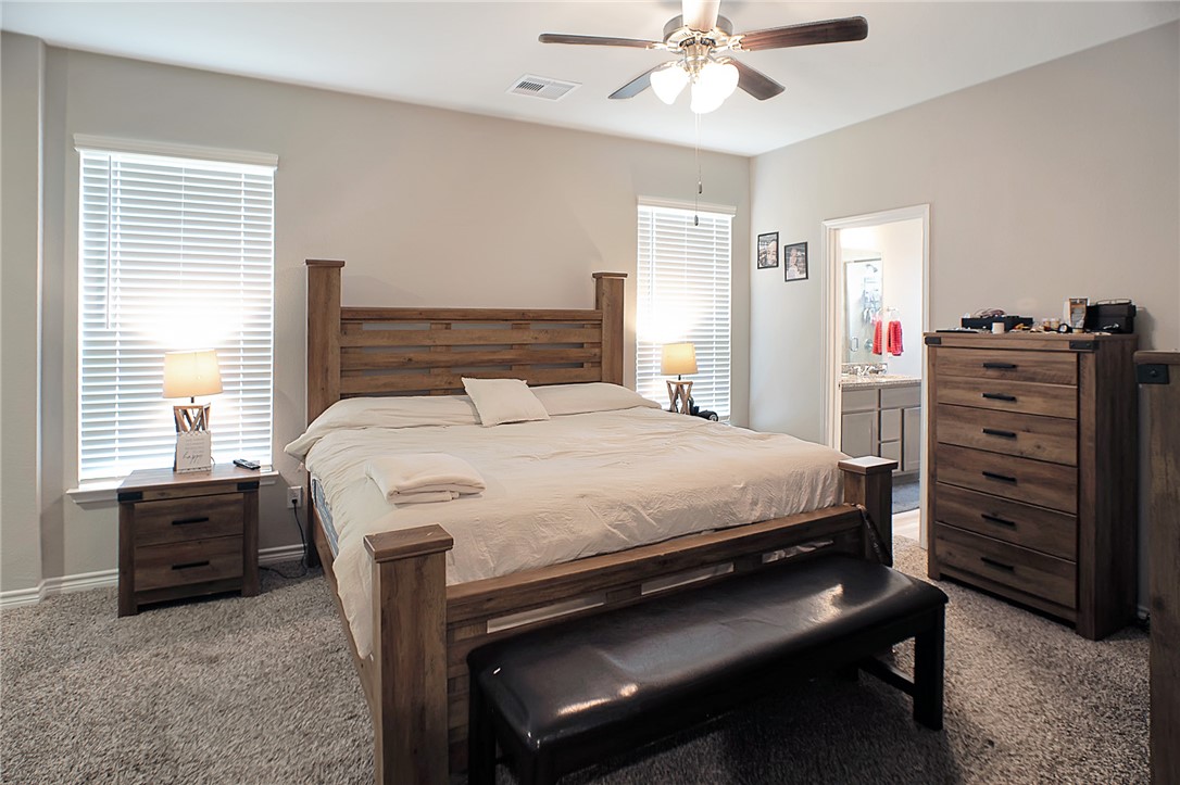 2037 Rock Rdg Avenue Bryan, TX 77807 - Photo 8 of 27 a bedroom with a bed and a dresser