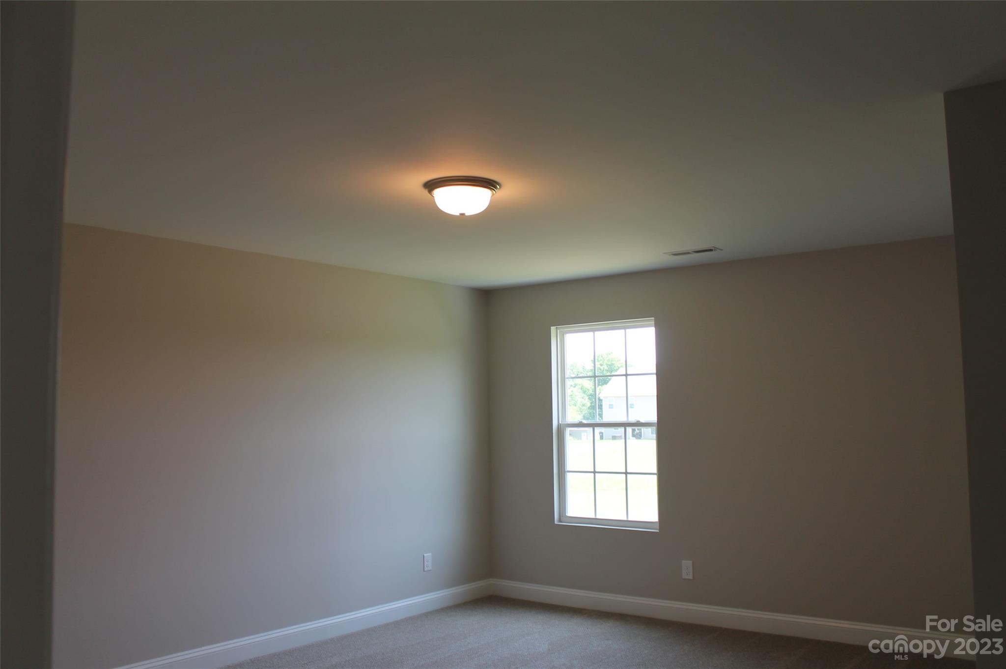 3818 New Salem Road Monroe, NC 28110 - Photo 15 of 15 an empty room with windows and closet