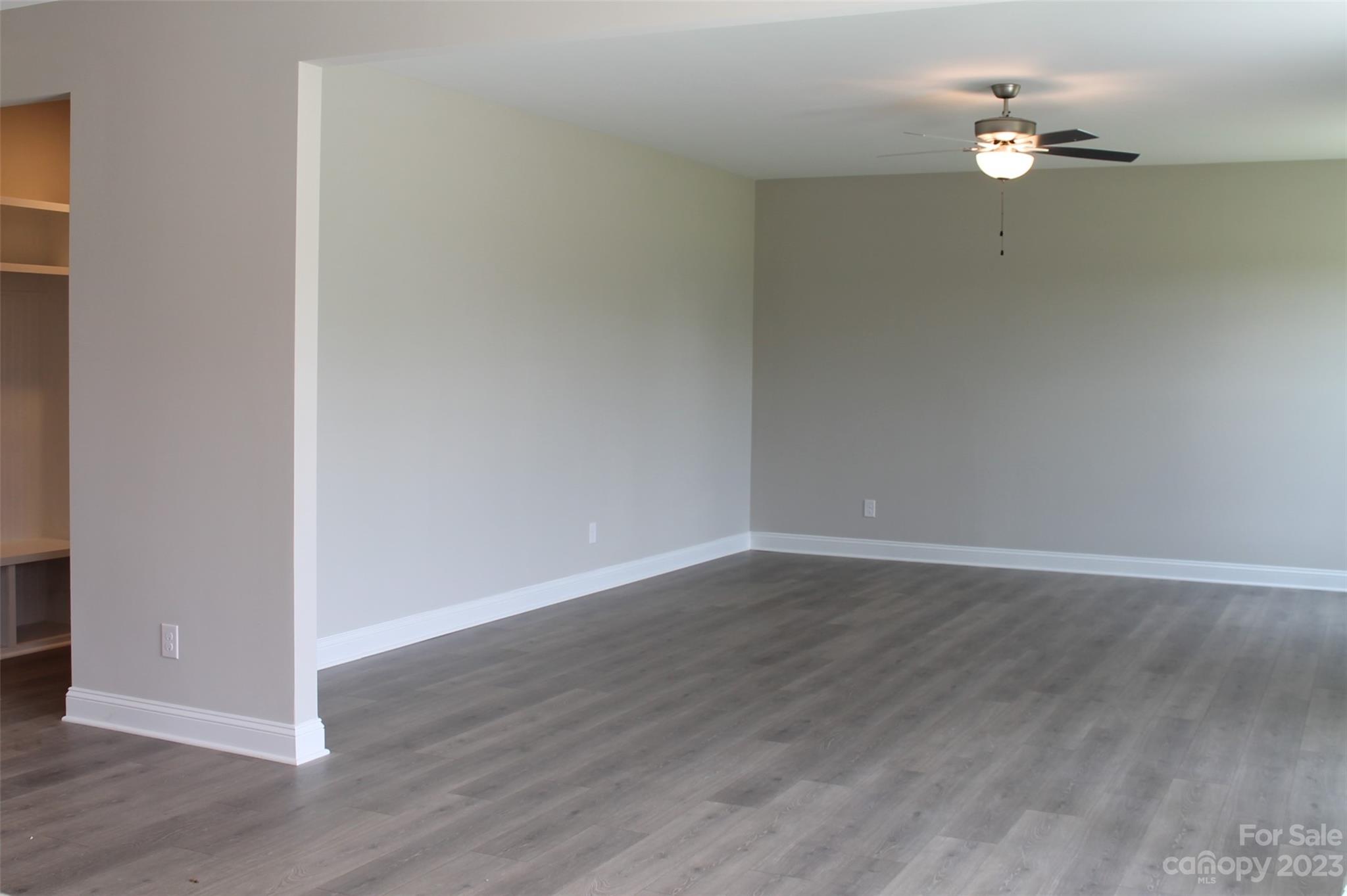 3818 New Salem Road Monroe, NC 28110 - Photo 9 of 15 a view of an empty room with wooden floor