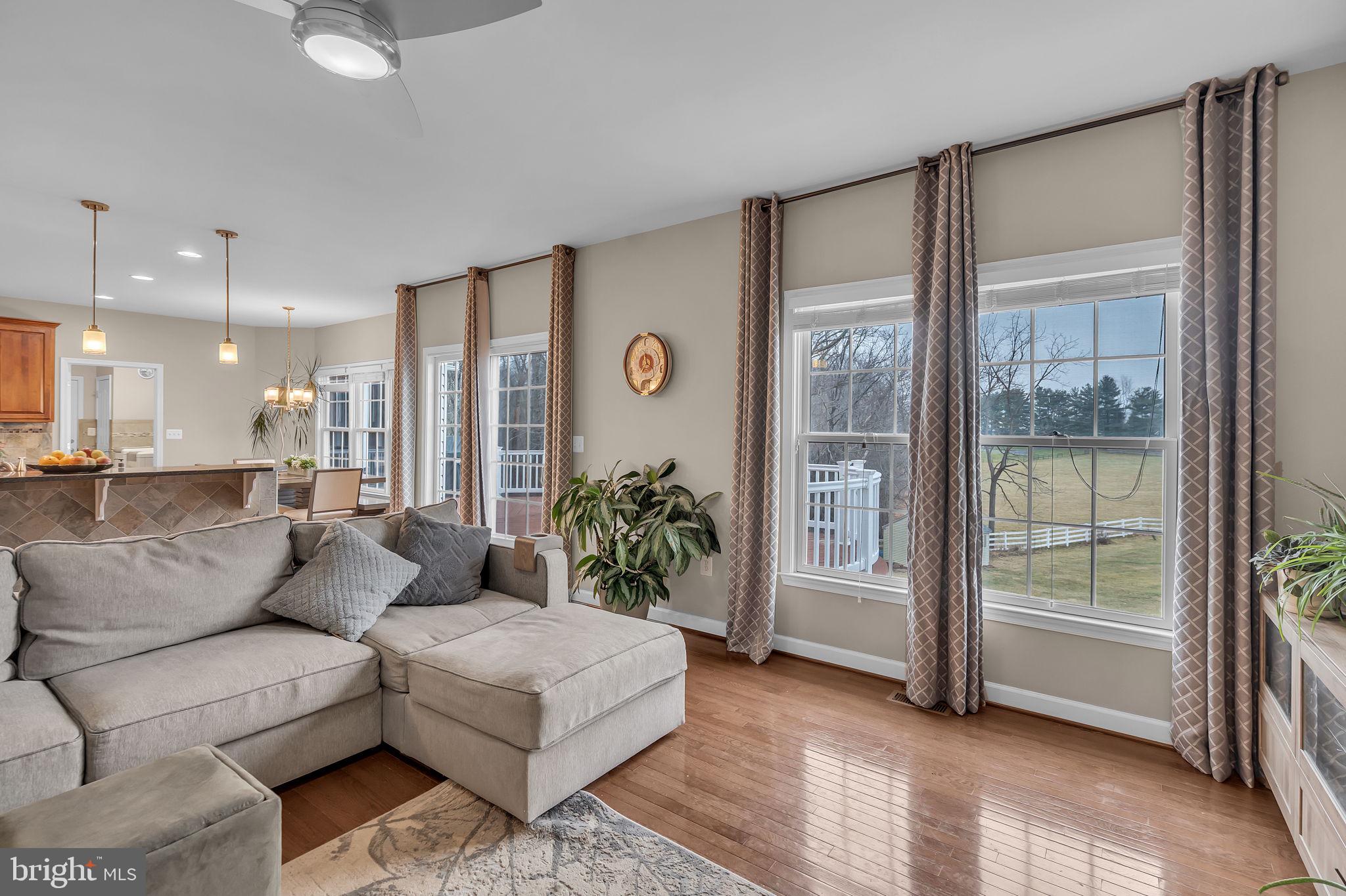 18631 Brick Store Road Hampstead, MD 21074 - Photo 24 of 64 a living room with furniture and a large window