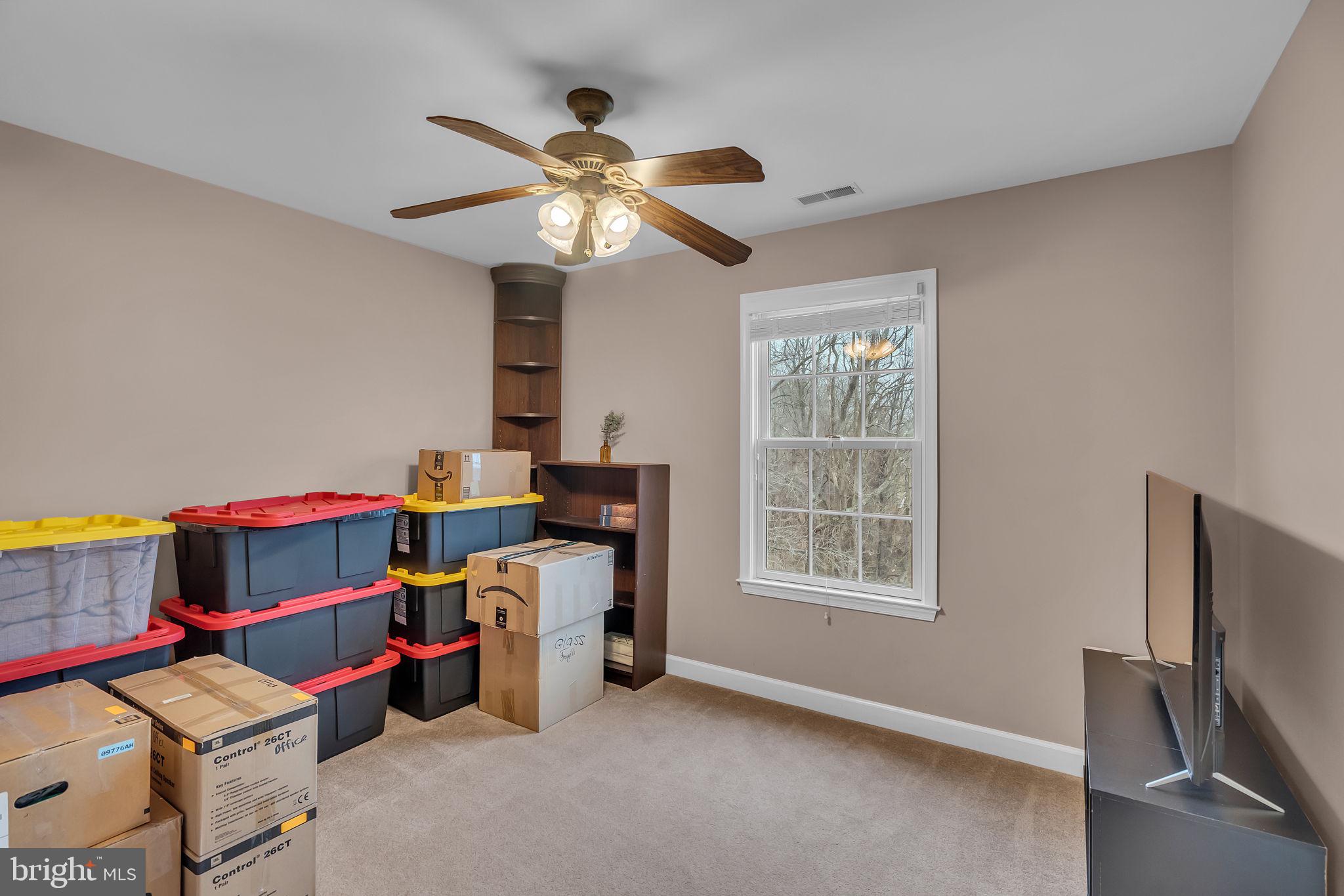 18631 Brick Store Road Hampstead, MD 21074 - Photo 34 of 64 a view of a workspace with furniture and a window