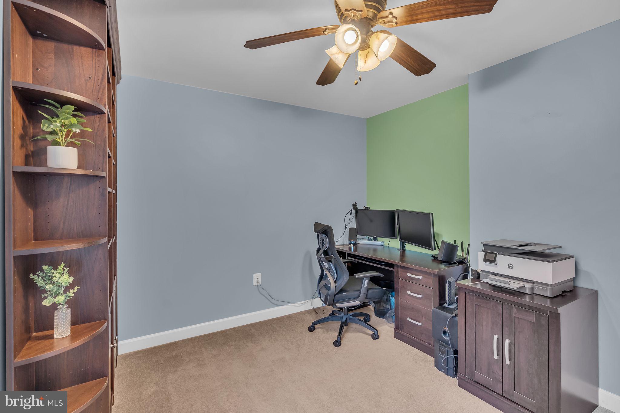 18631 Brick Store Road Hampstead, MD 21074 - Photo 35 of 64 a view of a workspace with furniture and a window