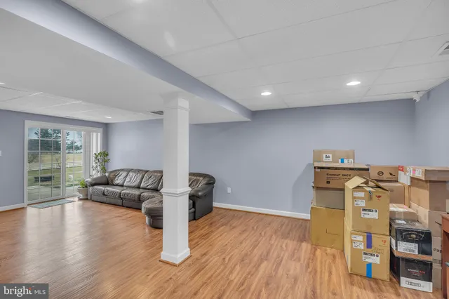 a bathroom with a sink vanity and mirror