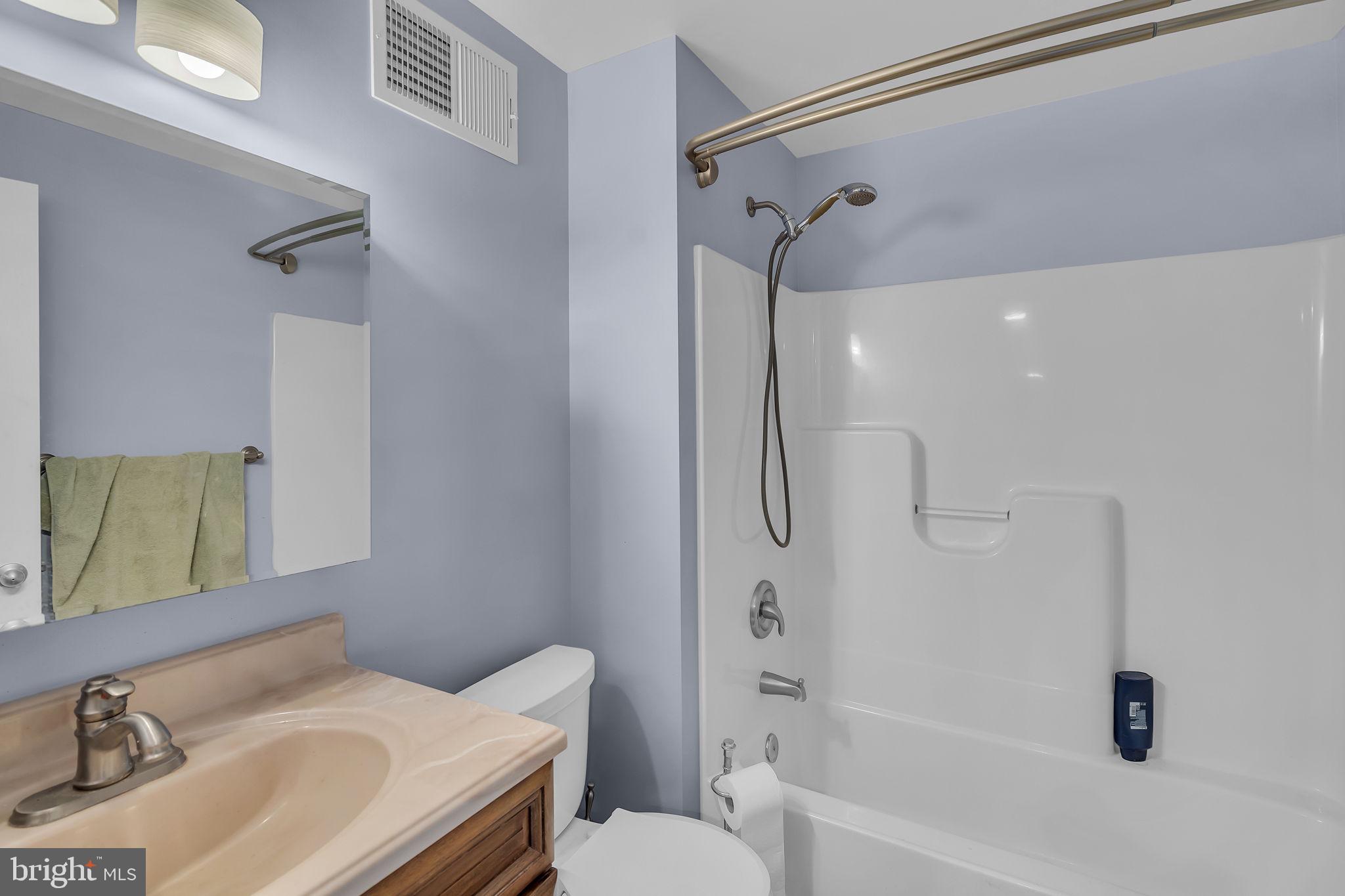 18631 Brick Store Road Hampstead, MD 21074 - Photo 42 of 64 a bathroom with a sink toilet and shower