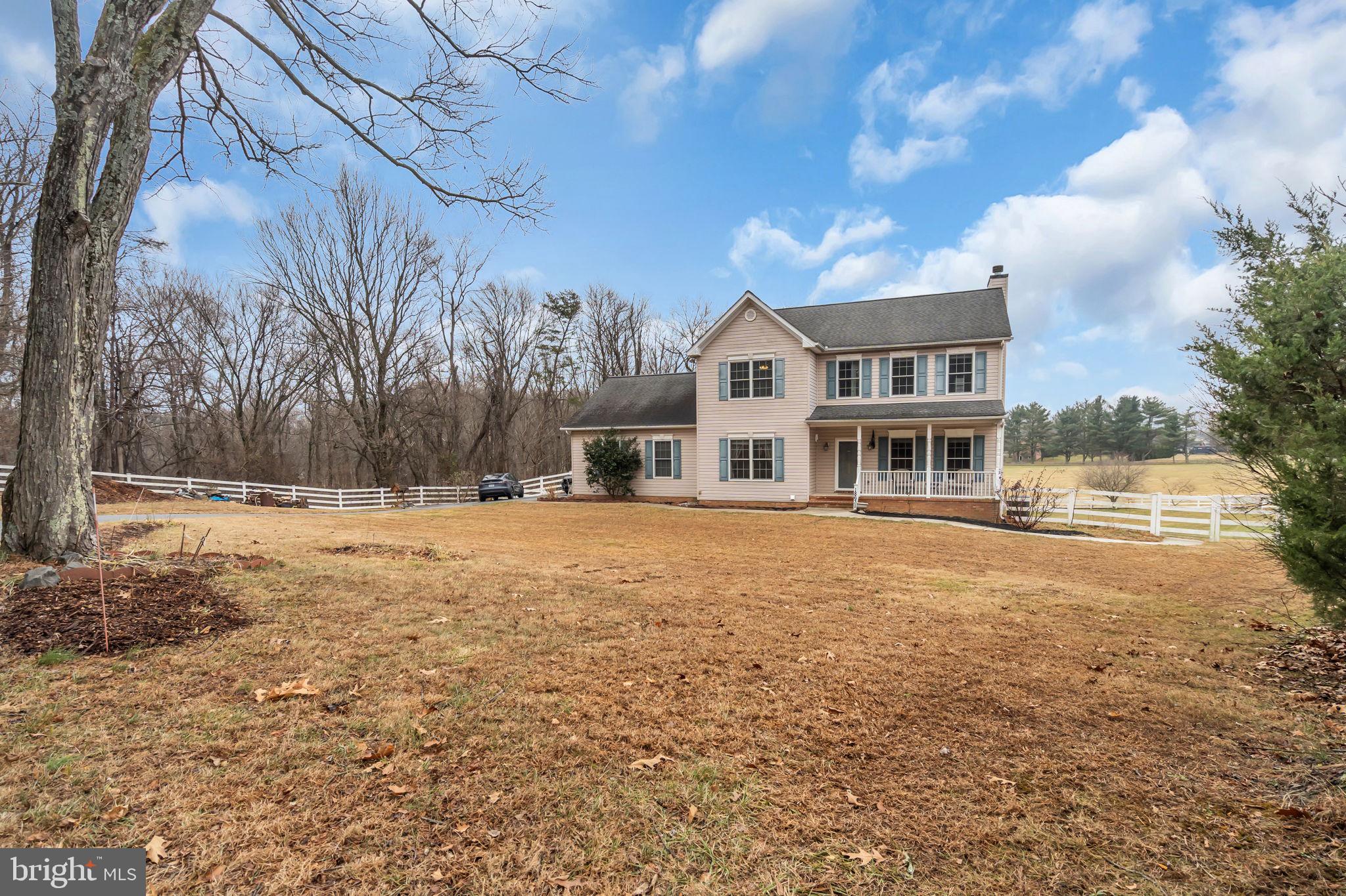 18631 Brick Store Road Hampstead, MD 21074 - Photo 53 of 64 a front view of a house with a yard