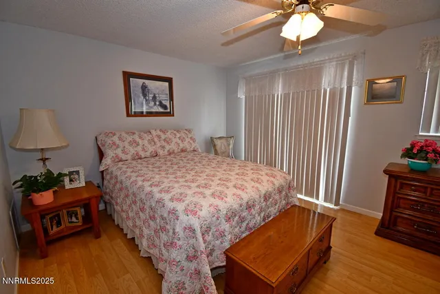 a kitchen with stainless steel appliances granite countertop a sink stove and wooden cabinets