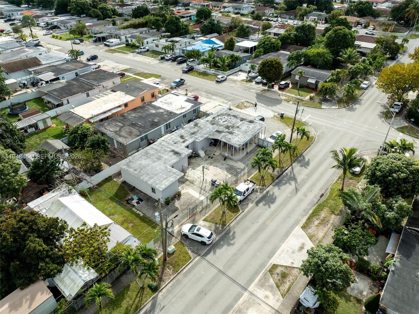 201 East 44th Street Hialeah, FL 33013 - Photo 38 of 39 an aerial view of residential houses with outdoor space