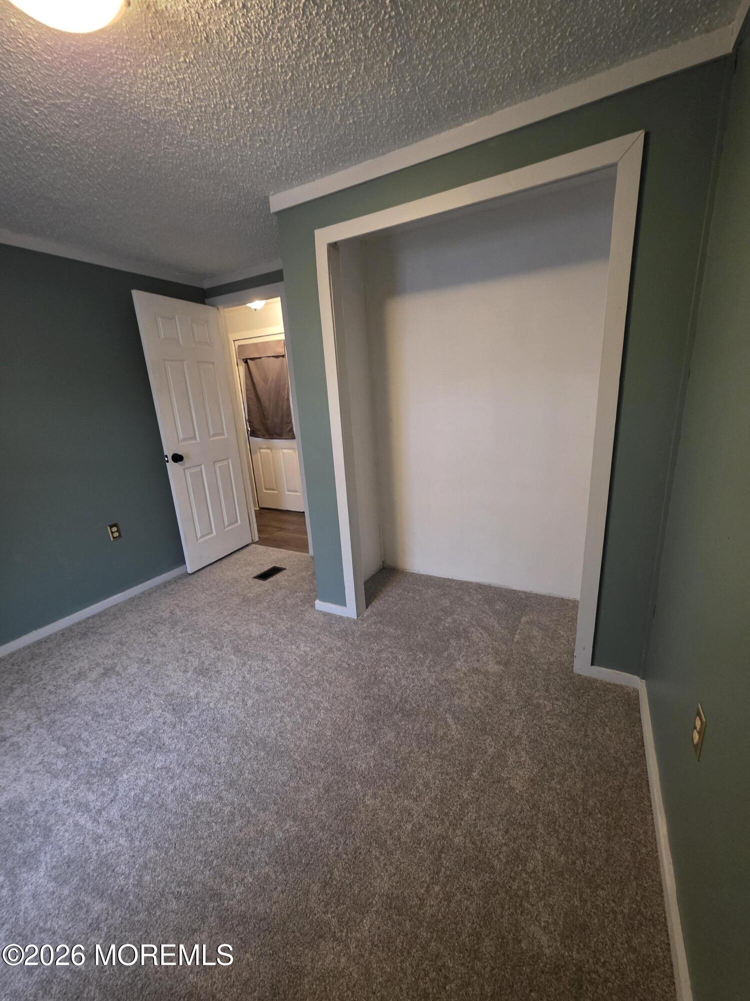 80 Secretariat Street, Unit 66 Howell, NJ 07731 - Photo 13 of 25 a view of empty room