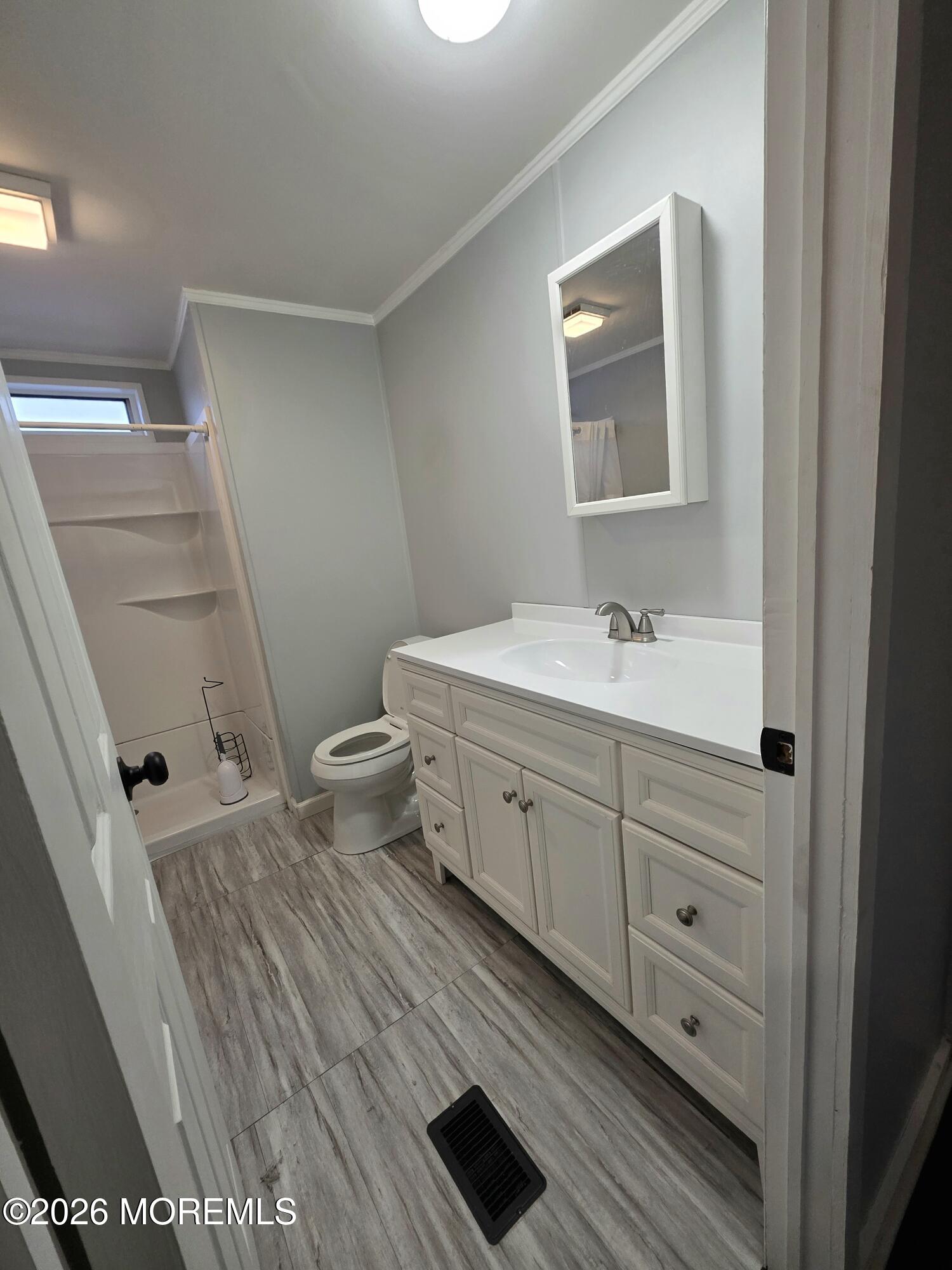 80 Secretariat Street, Unit 66 Howell, NJ 07731 - Photo 15 of 25 a spacious bathroom with a double vanity sink toilet and a mirror