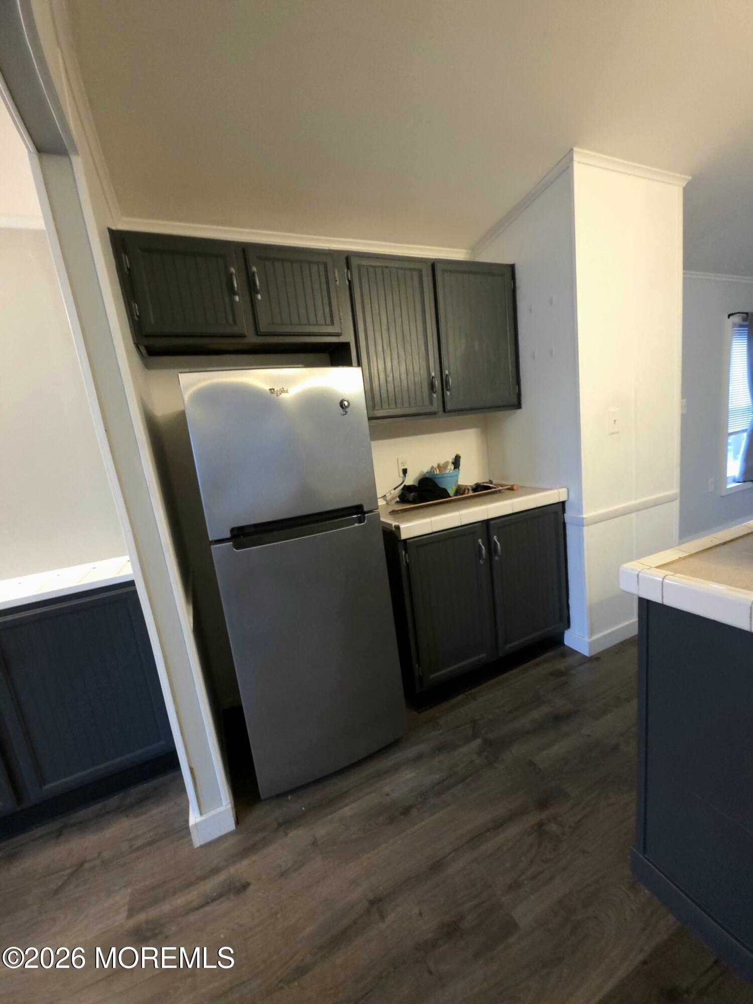 80 Secretariat Street, Unit 66 Howell, NJ 07731 - Photo 6 of 25 a kitchen with stainless steel appliances a refrigerator and a sink