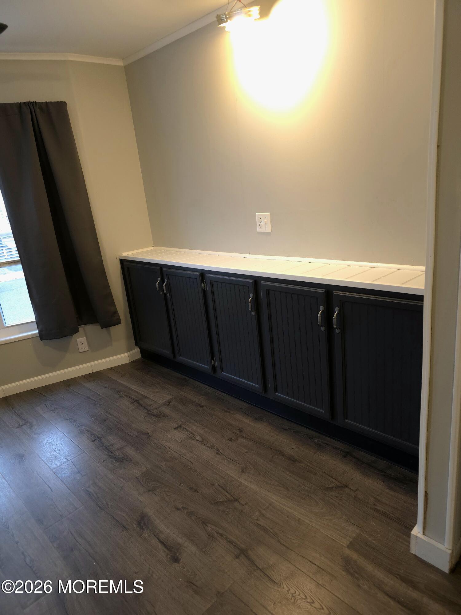 80 Secretariat Street, Unit 66 Howell, NJ 07731 - Photo 8 of 25 an empty room with wooden floor