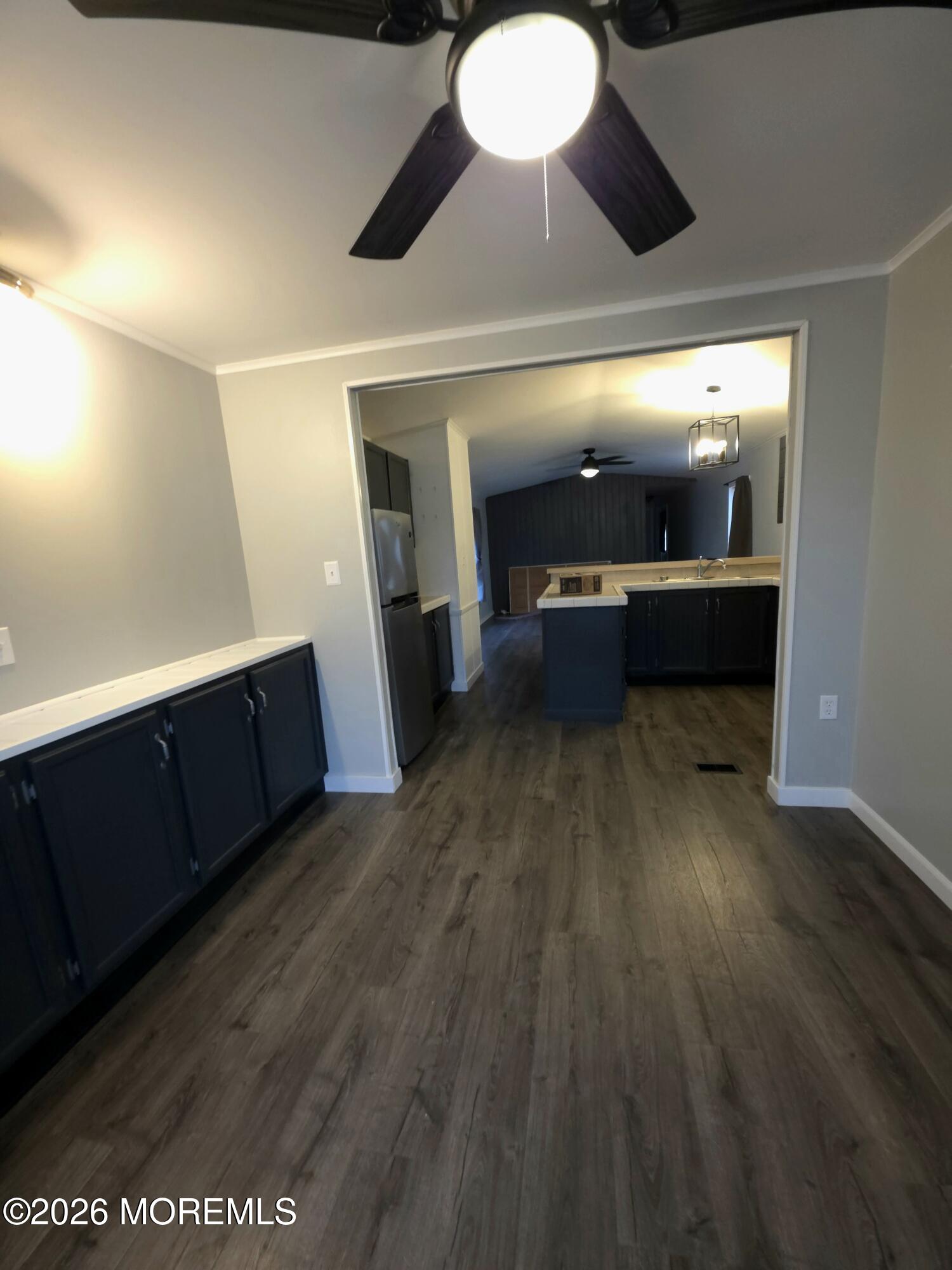 80 Secretariat Street, Unit 66 Howell, NJ 07731 - Photo 9 of 25 a view of kitchen with stainless steel appliances wooden floor