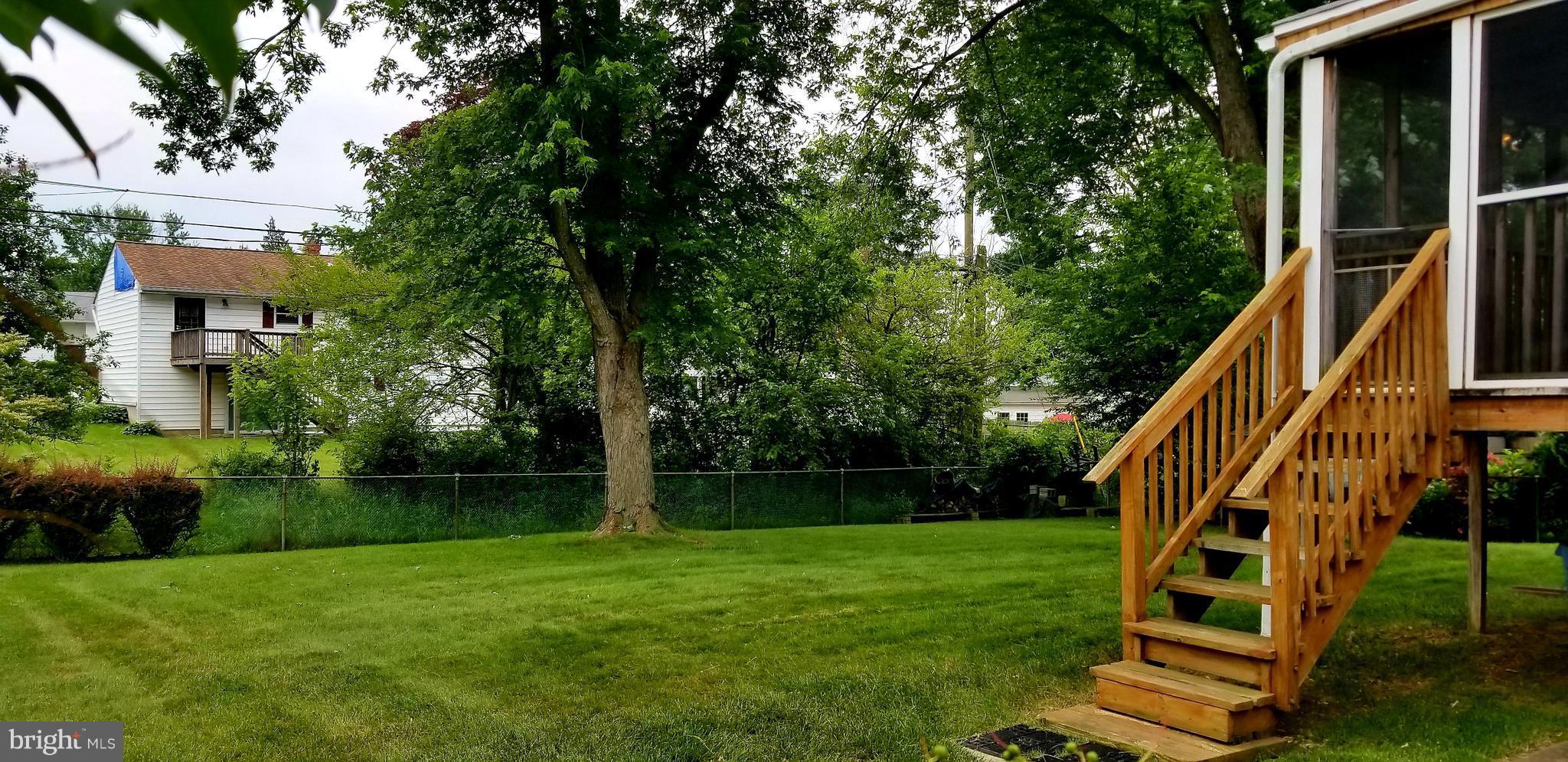 3907 Sybil Road Randallstown, MD 21133 - Photo 3 of 30 a view of a house with a backyard