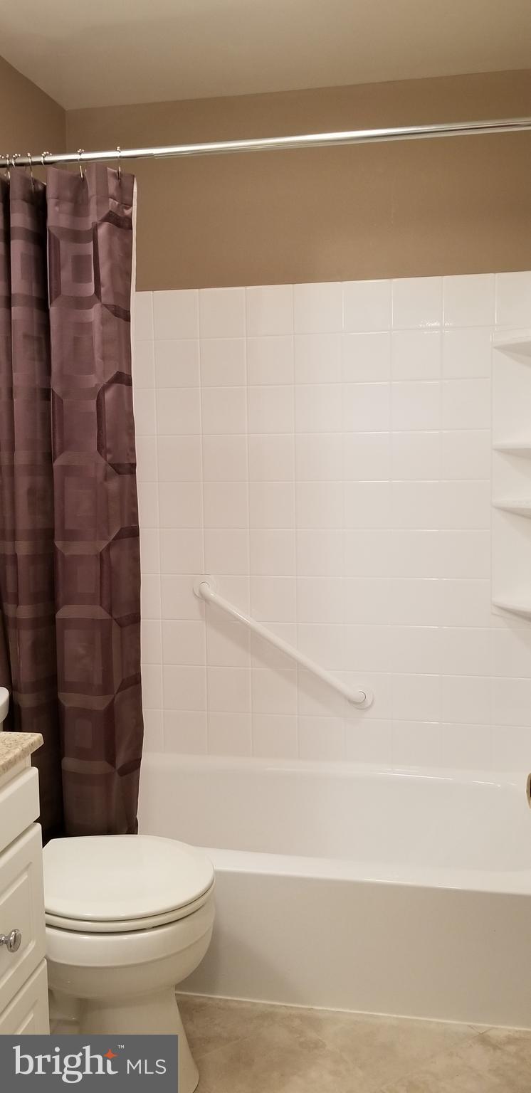 3907 Sybil Road Randallstown, MD 21133 - Photo 21 of 30 a bathroom with a toilet and a shower