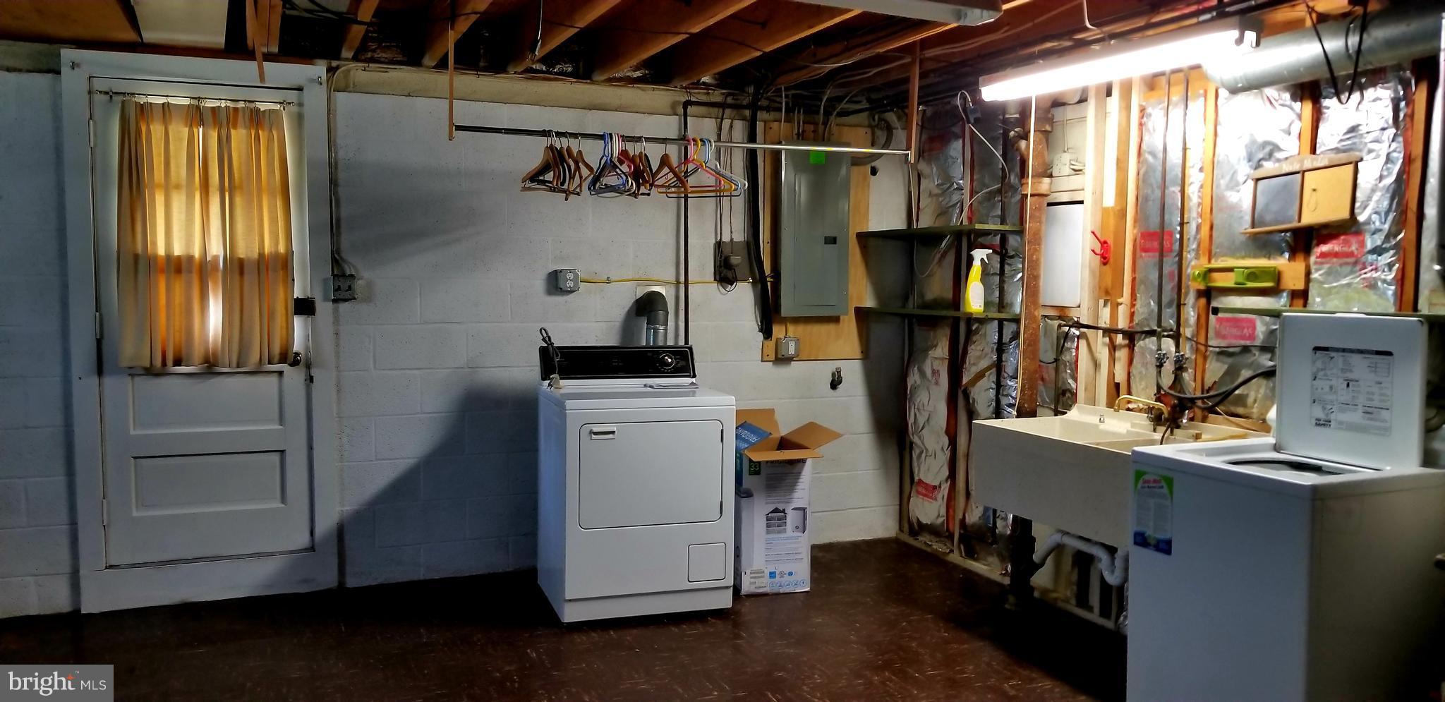 3907 Sybil Road Randallstown, MD 21133 - Photo 30 of 30 a utility room with dryer and washer